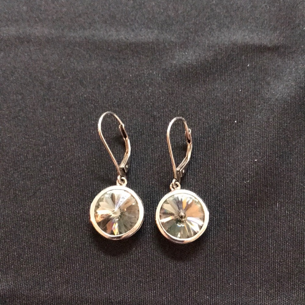 Greenish blue crystal earrings.